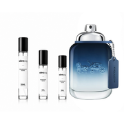 Coach blue Coach decant sample bottle by The Scent Plug, featuring a sleek design and the signature Coach branding.