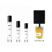 Duro Nasomatto decant sample by The Scent Plug, featuring the iconic perfume bottle with sleek design and label details visible.