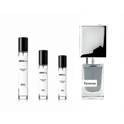 Sample of Fantomas Nasomatto perfume decant, showcasing the small clear bottle with a black cap and label, used for fragrance testing.
