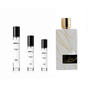 Fursan White Khadlaj perfume decant sample by The Scent Plug, featuring a sleek glass vial with white and gold accents.