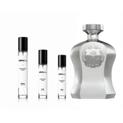 Highness White Afnan decant sample by The Scent Plug, showcasing a sleek, white fragrance bottle with elegant design details.