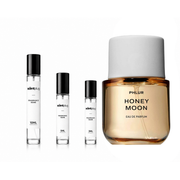 Honey Moon by Phlur perfume sample in a small decant bottle, showing the fragrance label and clear glass container.