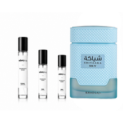 Shiyaaka Sky Khadlaj perfume decant sample by The Scent Plug, featuring a clear glass bottle with a black cap and white label.