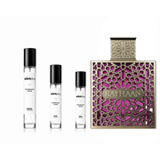 Kiss Rayhaan by The Scent Plug, perfume decant sample bottle with pink and white label showing floral design.