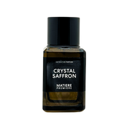 Matière Première Crystal Saffron Extrait perfume bottle with elegant glass design and gold accents, showcasing the luxurious fragrance.