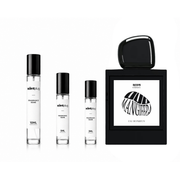 Sample of Oud Mangifera Rahasya decant by The Scent Plug, showcasing the elegant bottle and rich fragrance details.