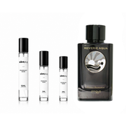 Reverie Aqua Zimaya fragrance decant from The Scent Plug, showing a clear glass bottle with a silver cap and light blue liquid inside.