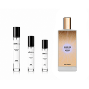 Sample of Shams Oud Memo Paris perfume decant by The Scent Plug, featuring a small vial with oud fragrance.