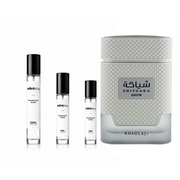Sample of Shiyaaka Snow Khadlaj perfume decant by The Scent Plug, showcasing the small perfume bottle with elegant design.