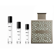 Sample of Terra Rayhaan decant perfume by The Scent Plug, showing the small bottle with branding and perfume liquid.