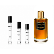 Decant of Tonka Cola by Mancera, sample size from The Scent Plug, featuring a bottle with a label and a metallic cap.