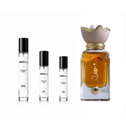 Zumar Ahmed Al Maghribi decant sample by The Scent Plug, showcasing a sleek, dark-colored perfume bottle with elegant design details.