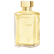 Maison Francis Kurkdjian APOM Eau de Parfum bottle with elegant packaging and floral design in the background.