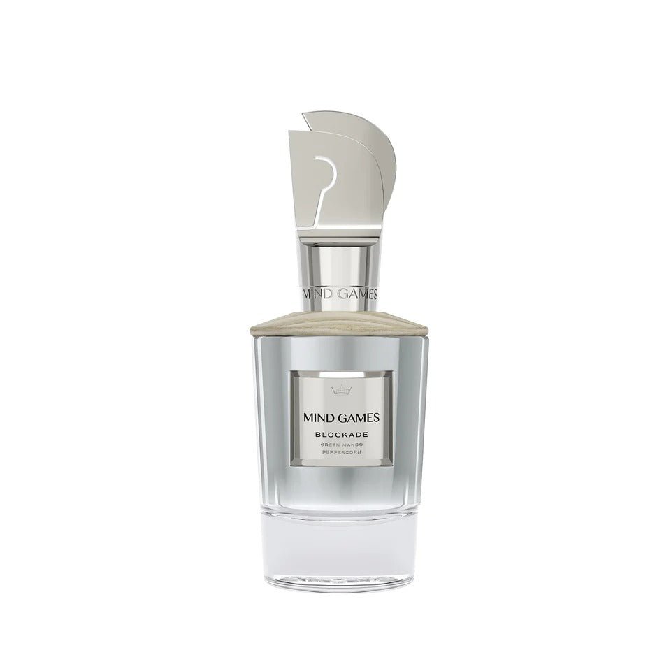 Mind Games Blockade extrait de parfum bottle with sleek design, showcasing the elegant fragrance packaging.