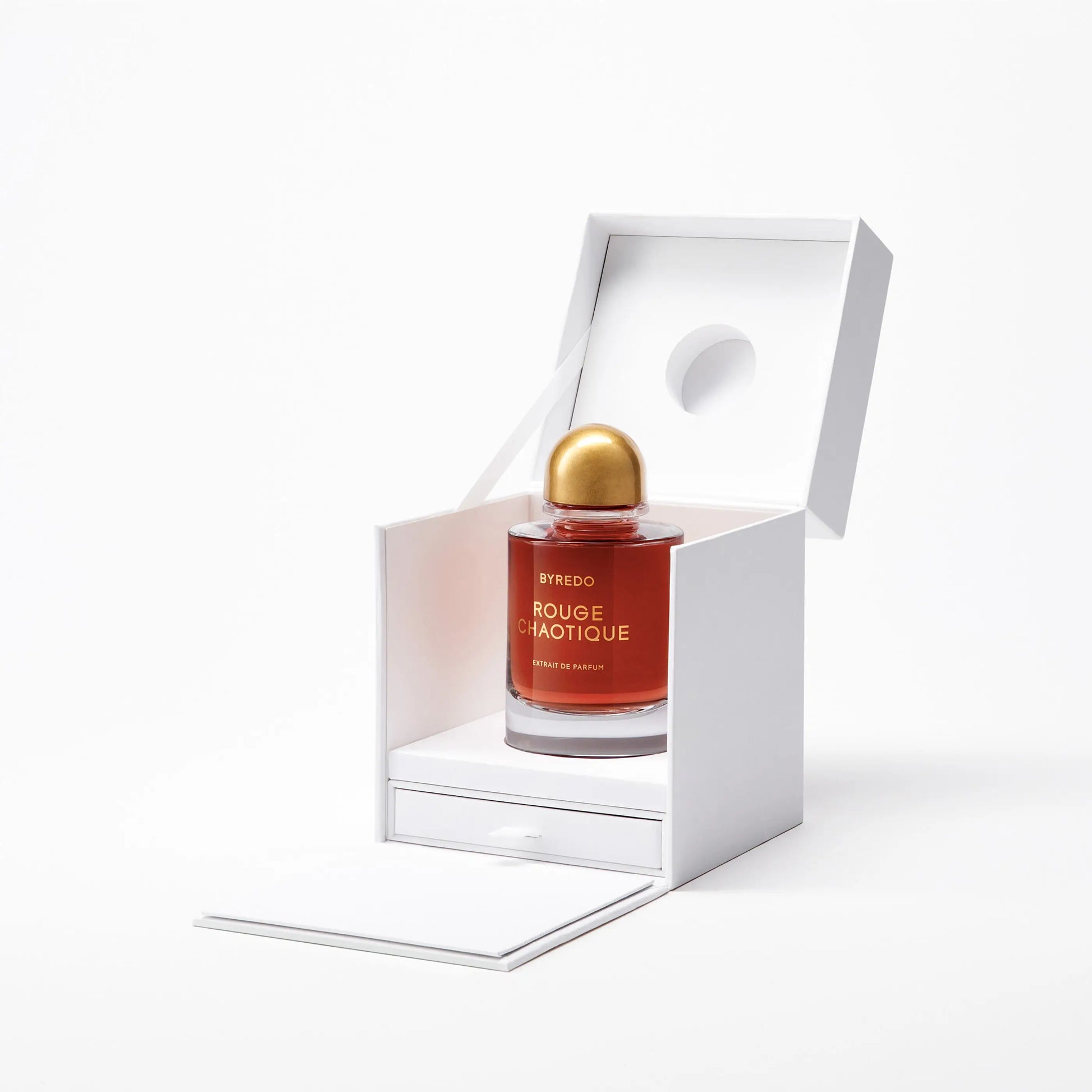 Byredo Rouge Chaotique Extrait de Parfum spray bottle, 2.4 oz (70 ml), elegant glass container with fragrance details.