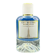 City Rhythm Manhattan Extrait de Parfum spray in 3.4 oz/100ml bottle, featuring elegant glass packaging with city-inspired design.
