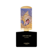 Floraiku Sand and Skin Eau de Parfum spray bottle, 1.7 oz, with a 10ml travel size, showcasing elegant packaging.