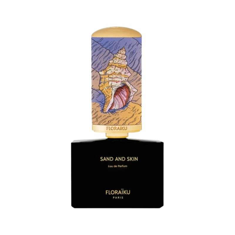 Floraiku Sand and Skin Eau de Parfum spray bottle, 1.7 oz, with a 10ml travel size, showcasing elegant packaging.