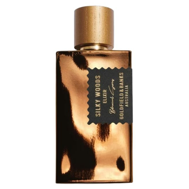 Goldfield & Banks Silky Woods Elixir extrait de parfum spray in 3.4 oz bottle, featuring a luxurious, woody fragrance.