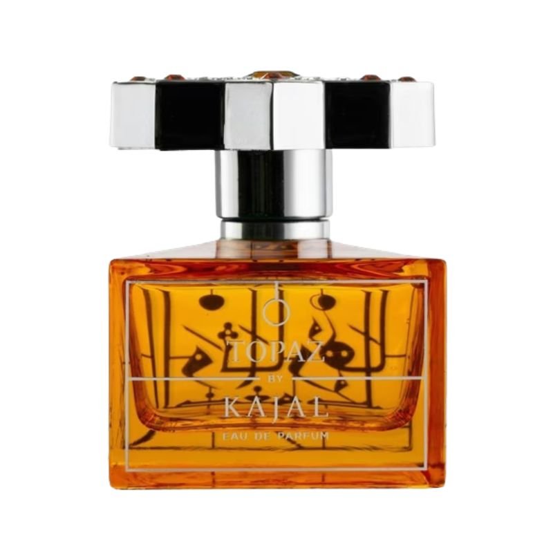 Kajal Topaz Eau de Parfum bottle with elegant gold accents, showcasing the luxurious fragrance design.