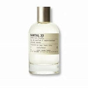 Le Labo Santal 33 Eau De Parfum spray in 3.4 oz bottle, featuring a sleek glass design and signature scent.