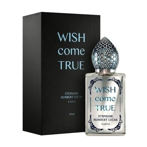 Stephane Humbert Lucas Wish Come True Eau De Parfum spray bottle, 1.7 oz (50 ml), elegant perfume with intricate packaging.