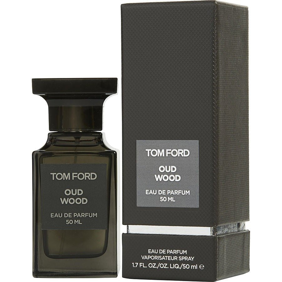Tom Ford Oud Wood Eau De Parfum spray bottle with 1.7 oz (50ml) size, featuring a sleek glass design and gold accents.
